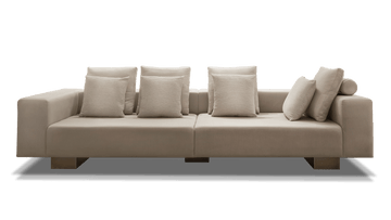 Amsterdam Sofa featuring a long beige modern design with plush cushions for comfort