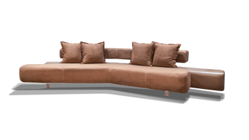 Tan-colored nice angled sofa with six throw pillows, perfect for modern living rooms